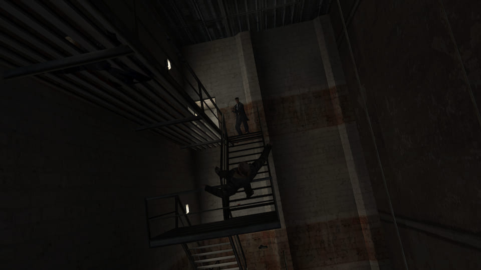 Screenshot of Max Payne finishing off a mobster falling off a fire escape.